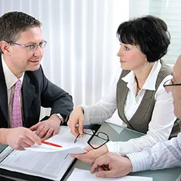 People discussing around a table