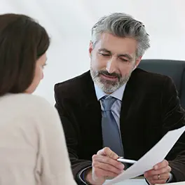 A closing agent talking to a client